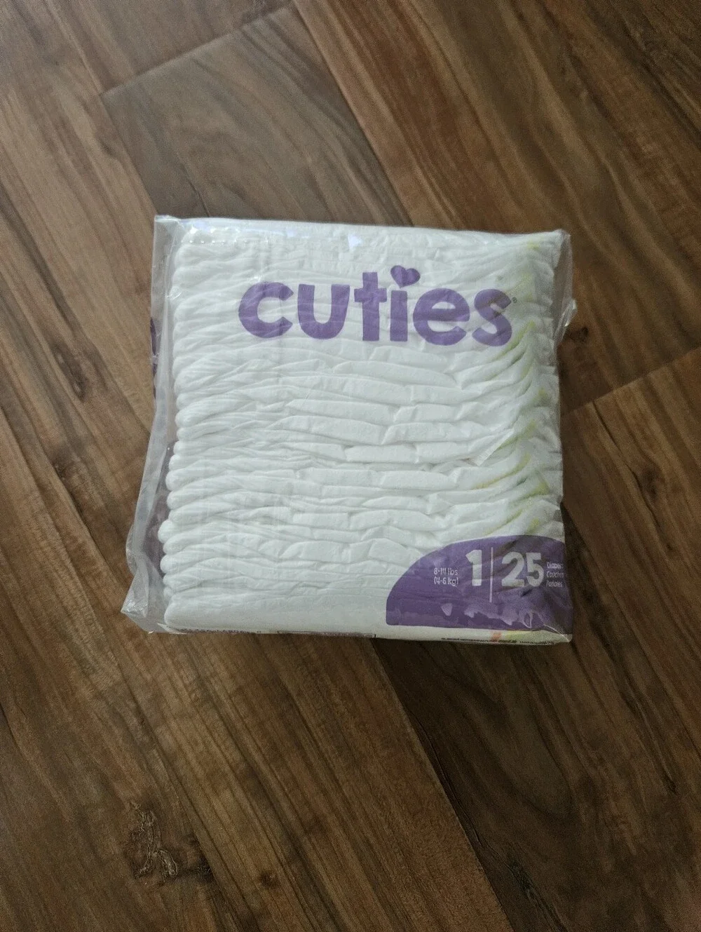 Cuties Baby Diapers Pack - White with Purple Logo Size 1